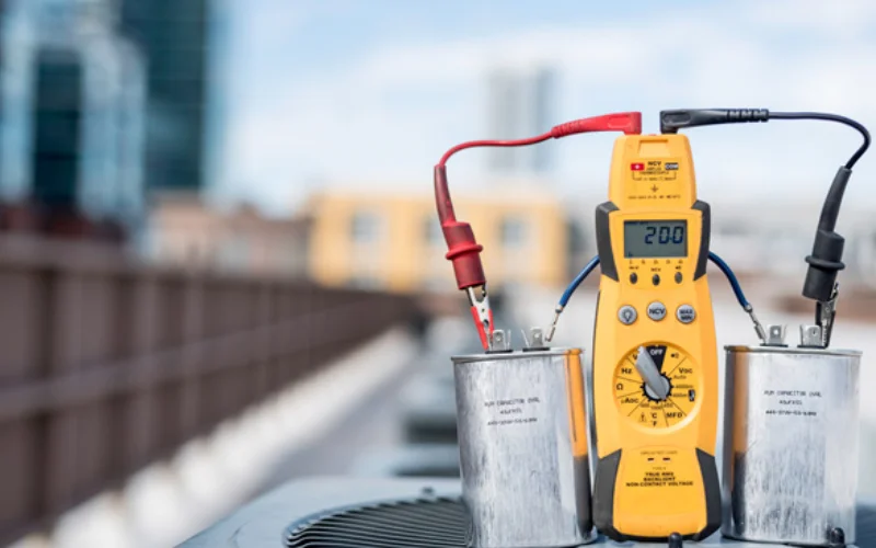 what does an air conditioner capacitor do